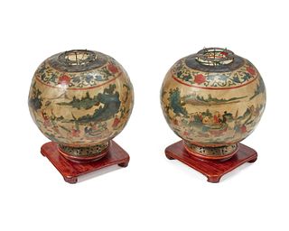 A pair of Chinese vellum globe lanterns