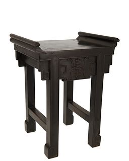 A small Chinese carved hardwood stand