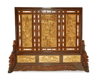 A monumental Chinese carved wood floor screen