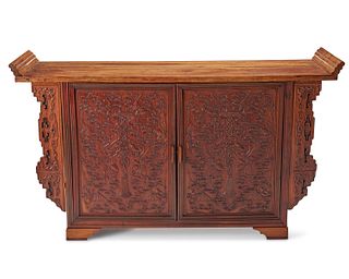 A Chinese carved wood cabinet
