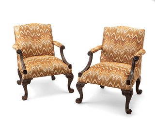 A pair of English George III library armchairs