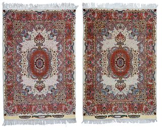 A pair of Tabriz area rugs