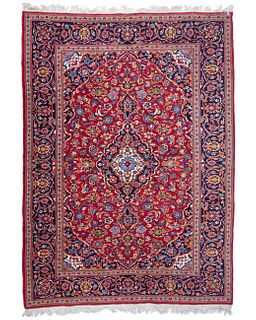 A Kashan area rug