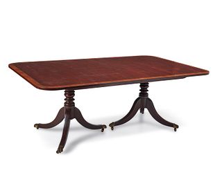 A Kittinger Chippendale-style dining table
