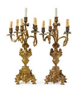 A pair of gilt-bronze candle lamps