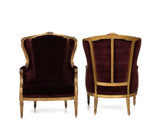 A pair of French Louis XVI-style bergere chairs