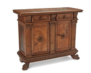 An Italian carved fruitwood cabinet