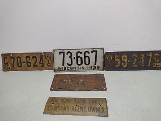 License plates 3 Wisconsin, 1Iowa