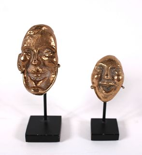 Two Bronze Double-Sided Face Sculptures