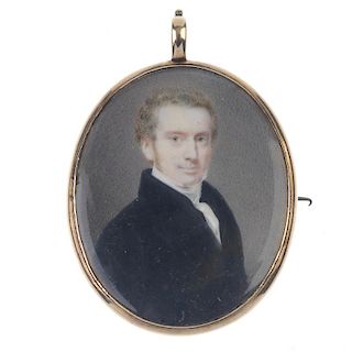 A mid Victorian hand painted portrait miniature mourning brooch. Of oval outline, the portrait of a