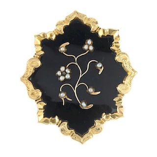 A late Victorian 9ct gold enamel and split pearl memorial brooch. The black enamel panel and scrolli