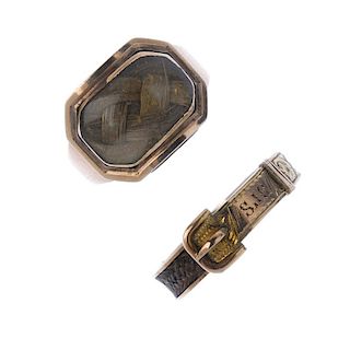 Two late 19th to early 20th century gold memorial rings. The first designed as a buckle ring, with w
