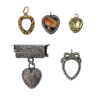 A selection of five mid to late Victorian heart-shape memorial pendants. To include a moss agate hea