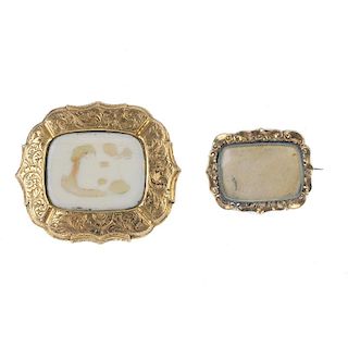 Two late Victorian gold memorial brooches. To include an ivory scrolling brooch, together with a wov