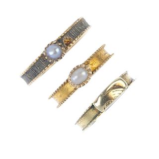 A selection of three mid Victorian gold memorial rings. To include two split pearl and woven hair ba