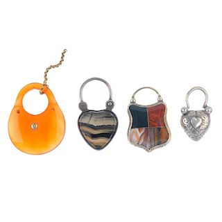 A selection of four late 19th century padlock clasps. To include a carnelian padlock, an agate and b