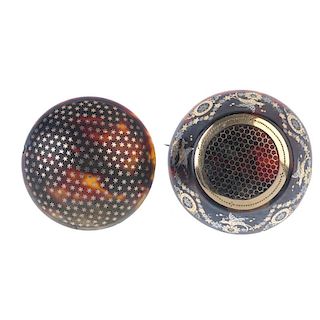 Two late 19th century pique tortoiseshell brooches. To include a circular-shape brooch with star acc