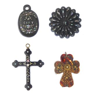 A selection of late Victorian tortoiseshell jewellery. To include a mother-of-pearl inlay cross pend