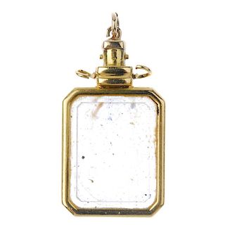 An early 20th century scent bottle pendant. Of rectangular-shape outline, the side faceted rock crys