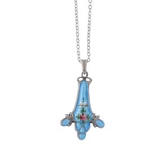 CHARLES HORNER - a pendant and a brooch. The tapered pendant decorated with blue enamel and floral d