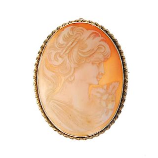 A 9ct gold cameo brooch. The shell depicting a lady in profile. Hallmark for Birmingham, 1949. Lengt