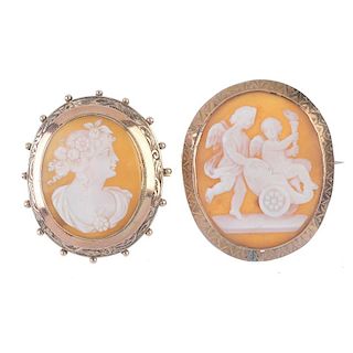 Two shell cameo brooches. To include a cameo depicting a bacchante within a scrolling and bead borde