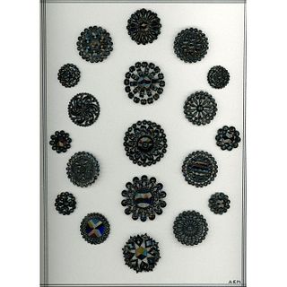 A WHOLE CARD OF DIVISION ONE BLACK GLASS BUTTONS
