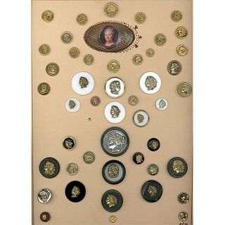 A FULL CARD OF ASSORTED MATERIAL HEAD BUTTONS