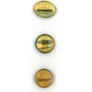 SMALL CARD OF ASSORTED TRANSPORTATION CELLULOID BUTTONS