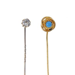 Two stickpins. The first a turquoise cabochon to the rope-twist surround and a colourless paste stic