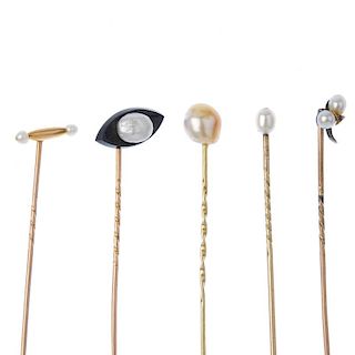 A selection of five pearl stickpins. To include a semi-baroque pearl stickpin, a semi-baroque pearl
