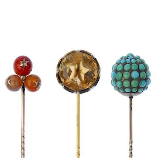 A selection of gem-set stickpins. To include a late 19th century carnelian sphere trefoil stickpin,