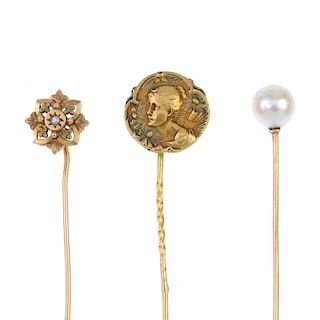 A selection of stickpins. To include one with a single cultured pearl set to the top, another with a