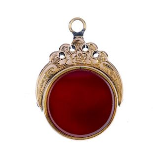 A swivel fob. The circular swivel panel with bloodstone to one side and carnelian to the other, to t