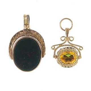 Two swivel fobs. The first of oval-outline, with carnelian to one side and bloodstone to the other,