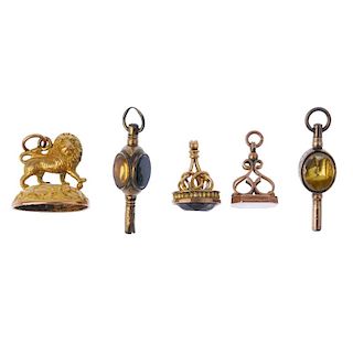 A selection of three fobs and two watch keys. The first with stone deficient, the pedestal designed