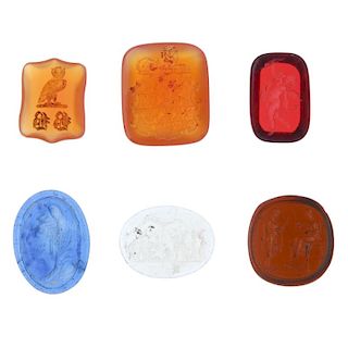 A selection of twenty-three loose fob seals. To include two hardstone reverse intaglio armorial carv
