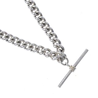 Two silver guard chains. The first of curb-link design to the T-bar clasp, the second a fancy-link c