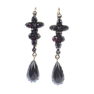 Two pairs of garnet ear pendants. The first pair each designed as a foil back garnet girandole with