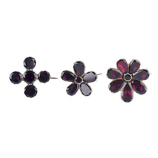 A selection of three 19th century gold foil back garnet brooches. To include a floral cluster brooch