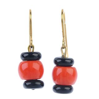 A pair of dyed coral ear pendants. Each designed as two black gem bouton-shape beads with a coral be