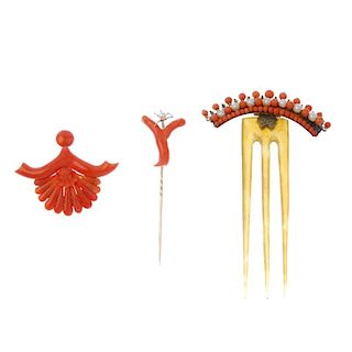 A selection of three coral items. To include a stylised fan and carved shell coral component, a bran