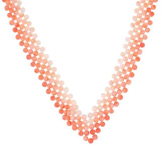 A coral bracelet and necklace. The necklace designed as five rows of coral of graduated tone, to a c