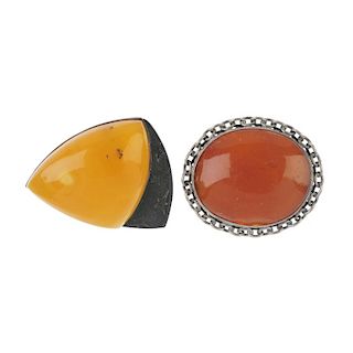 A selection of natural amber jewellery. To include a bracelet with three oval-shape beads alternatin