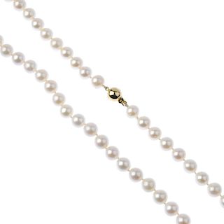 A cultured pearl necklace. The single row of twenty-six cultured pearls, to the spherical push-piece