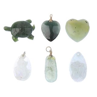 A selection of jade jewellery. To include a bracelet designed as four curved cylindrical links, four