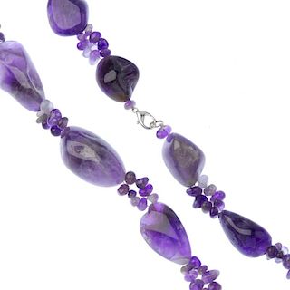 Two gem necklaces. The first of faceted rose quartz beads, the second with fluorite beads of alterna