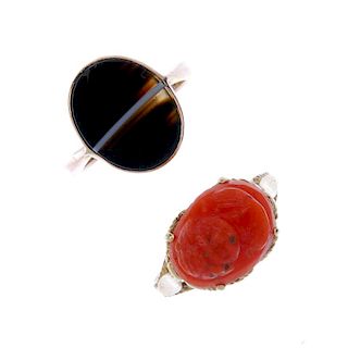 Two gem-set rings. The first a dyed coral cameo, carved to depict the portrait of a man, the second