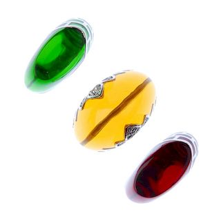 A selection of rings. To include a yellow paste ring, the paste set as a dome to the petal shape met