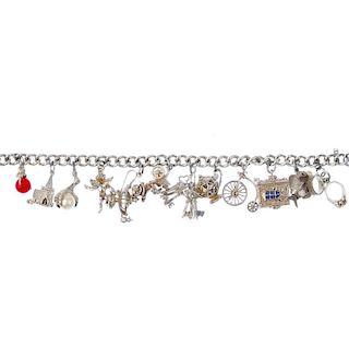 Three silver charm bracelets. To include a curb-link bracelet, suspending thirty-eight charms, to in